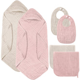 Hahafelt muslin hooded towel light green keeps baby warm and dry.