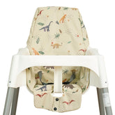 HALAA VAUVA high chair cover front view with dinosaur print and snug padding for comfort