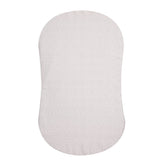 HALO BassiNest fitted sheet on pad offers secure fit and quick changes.