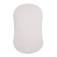 HALO BassiNest fitted sheet on pad offers secure fit and quick changes.