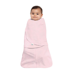 HALO Sleepsack Swaddle hands-to-face shows versatile sleep positions for newborns.