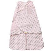 HALO Sleepsack Swaddle with plush dot velboa keeps newborn cozy and secure.