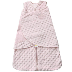 HALO Sleepsack Swaddle with plush dot velboa keeps newborn cozy and secure.