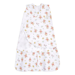 Halo Winnie Rainbows Sleepsack Swaddle in 100% cotton for snug, secure sleep.