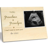 HAMUIERS pregnancy announcement frame with warm woodgrain finish, a cherished keepsake for grandparents.