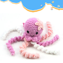 Eight tentacles encourage infant grasping and tactile exploration.