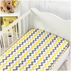 Handywa fitted crib sheet with white base and yellow-gray print for versatile nursery styling
