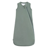 HAPIU bamboo sleep sack in dark forest green keeps baby cozy.