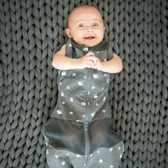 Happiest Baby Sleepea escape-proof Velcro secures snug swaddle and prevents self-unswaddling.