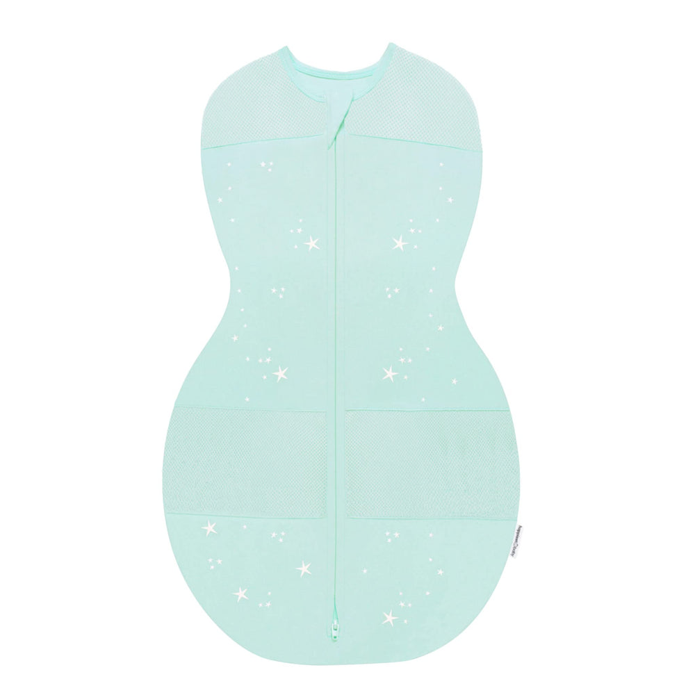 Happiest Baby Sleepea teal stars swaddle on baby, secure and soft