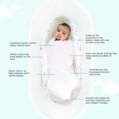 Happiest Baby SNOO Comforter Sack graphite small on baby demonstrating secure wings for back-sleep positioning