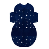 Happiest Baby SNOO Sleep Sack front view in midnight planets fabric with secure swaddle.