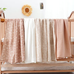 Happy Flute 4Set Muslin Swaddle Blankets demonstrate ultra-soft fabric ideal for soothing babies.