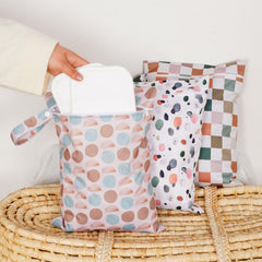 Happy Flute diaper wet bag keeps diaper changes tidy, lattice pattern adds style.