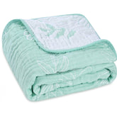 HardNok muslin blanket leaf-pattern close-up, breathable fabric ideal for sensitive baby skin.