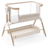 HARPPA rocking bassinet with wood grain finish for stylish bedside sleep