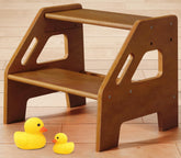 Harwaya walnut brown toddler step stool beside sink for easier handwashing.