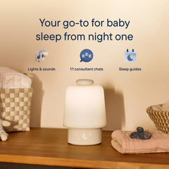 Hatch Rest Baby night light with soft glow on a nursery dresser