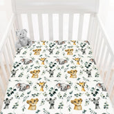 HawSkgFub African Safari animal leaf print crib sheet secures a snug fit and playful style.
