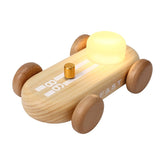 HBCIDC go-kart night light in wood finish brightens a kid's room with playful decor.