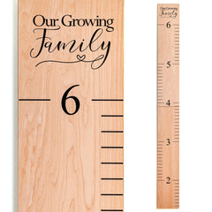 Headwaters Studio growth chart on wall in natural finish for family milestones.