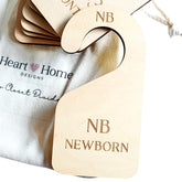 Heart and Home Designs double-sided baby closet divider for quick visibility in the nursery.