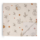 HECCEI muslin swaddle blanket close-up showing soft, breathable fibers for newborn comfort.