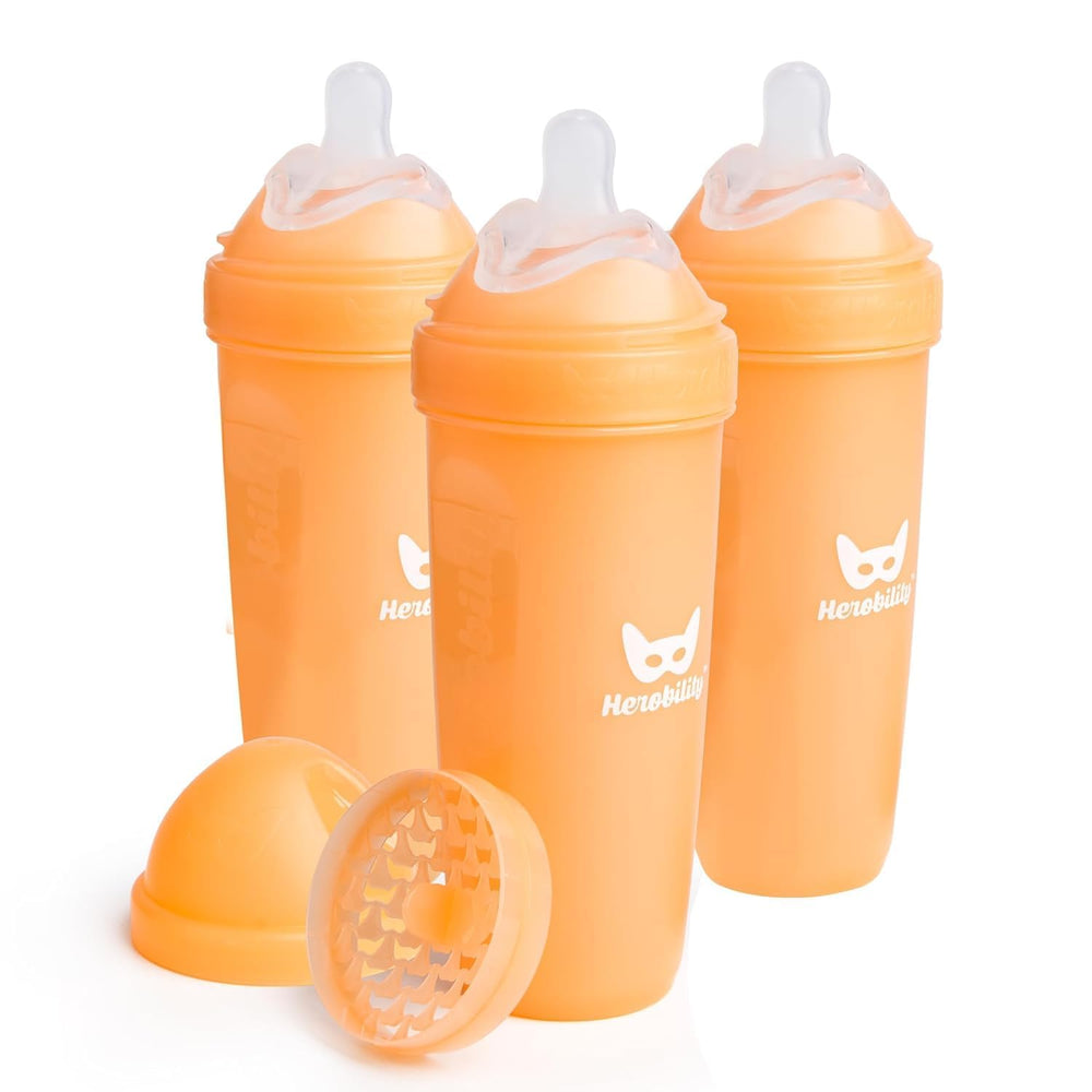 Herobility double anti-colic bottle 12oz peach front view, ergonomic design for easy feeding.