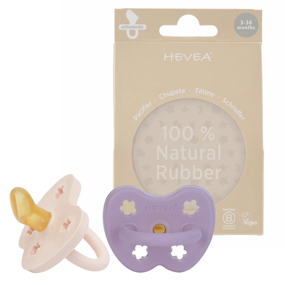 HEVEA natural rubber orthodontic pacifier in powder pink, designed for gentle teeth spacing