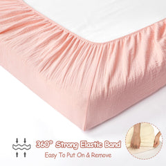 HNHUAMING eight-inch deep pockets with elastic straps secure the crib sheet.
