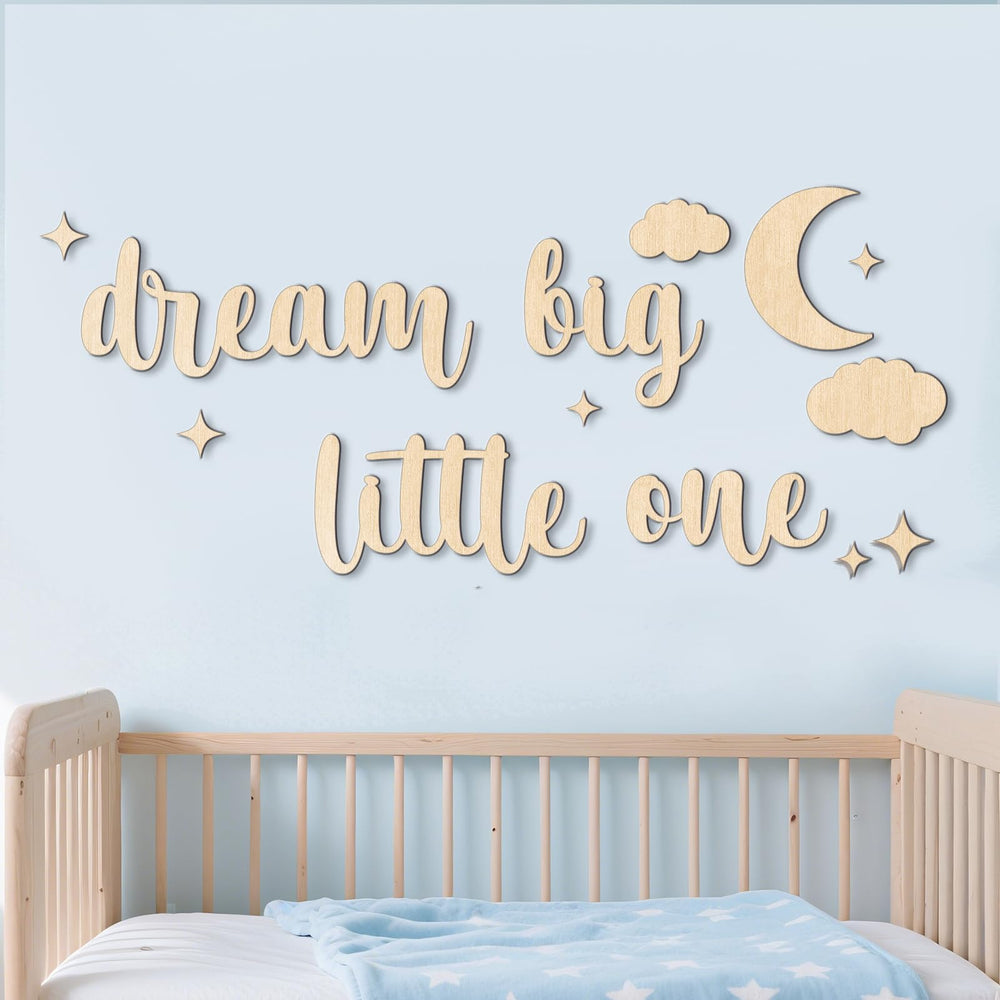 HomeCasa Dream sign enhances nursery decor with a warm focal point.