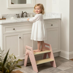 HOMEKOL pink wooden toddler stool front view provides sturdy handwashing support.