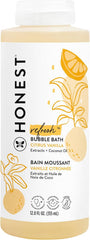 The Honest Company Citrus Vanilla bubble bath bottle with tear-free cleansing.