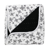 HonestBaby hand-stitched blanket close-up showing premium organic cotton softness