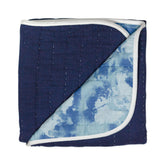 HonestBaby hand-stitched baby blanket with watercolor world print for cozy tummy time.