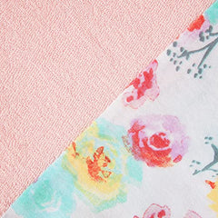HonestBaby machine-washable organic cotton cover designed for easy care in busy nurseries.