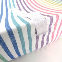 HonestBaby rainbow stripe changing pad cover in jersey for smooth, breathable surface.