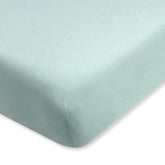 HonestBaby sage crib sheet flatlay shows soft, breathable organic cotton for comfortable naps.