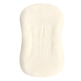 Hooyax muslin baby lounger cover in yellow shows soft texture for newborn comfort.