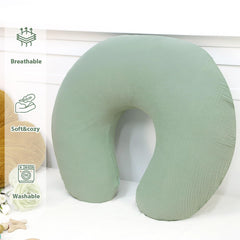 Hooyax muslin nursing pillow cover—nursery-style look pairs with green decor.