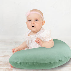 Hooyax nursing pillow cover on a pillow shows durable, easy-care fabric.