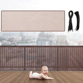 Hosuly banister guard netting on a brown railing protects kids and pets while preserving visibility.