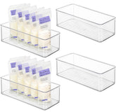 Hudgan four-piece breastmilk bins organized in fridge for quick bag access.
