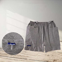 HUKSOSE shorts with catheter-secure button to keep tubes in place during movement.
