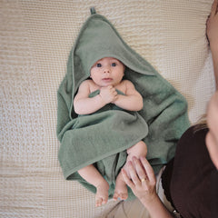 Huxie organic cotton close-up shows soft fibers ideal for sensitive baby skin.