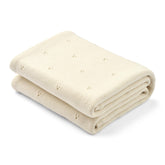 Huxie 30x40 ivory blanket laid flat, soft texture for delicate newborn skin.