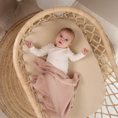 Huxie fitted crib sheet shows deep pockets for secure fit