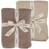 Huxie knitted baby blanket 30x40 for cozy swaddles and cuddles.