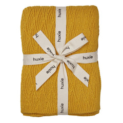 Huxie Knitted Baby Blanket Waves-Yellow close-up texture for gentle newborn skin contact.