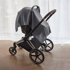 Huxie muslin blanket doubles as nursing or swaddle accessory
